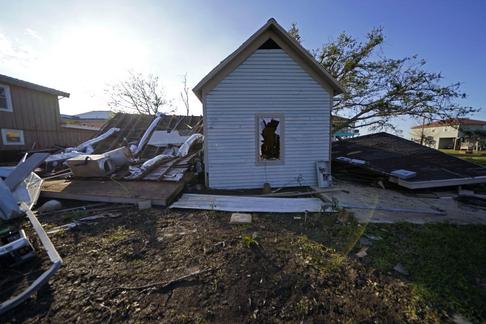 A destroyed home is seen in the aftermath of Hurricane Laura and Hurricane Delta, in Grand Lake, La., Friday, Dec. 4, 2020. (AP Photo/Gerald Herbert)