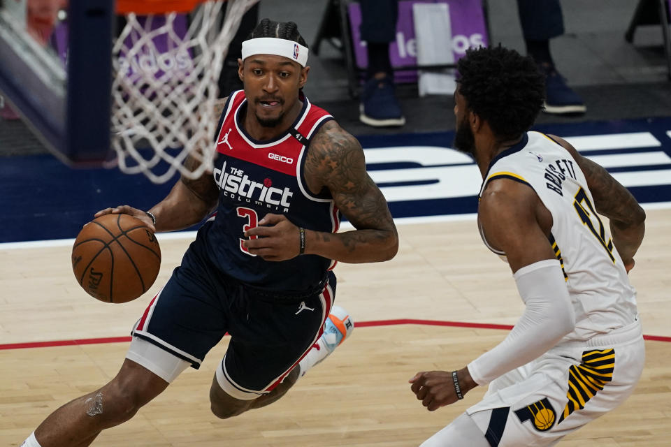 Washington Wizards guard Bradley Beal (3) drives against Indiana Pacers forward Oshae Brissett (12) during the first half of a basketball game, Monday, May 3, 2021, in Washington. (AP Photo/Alex Brandon)