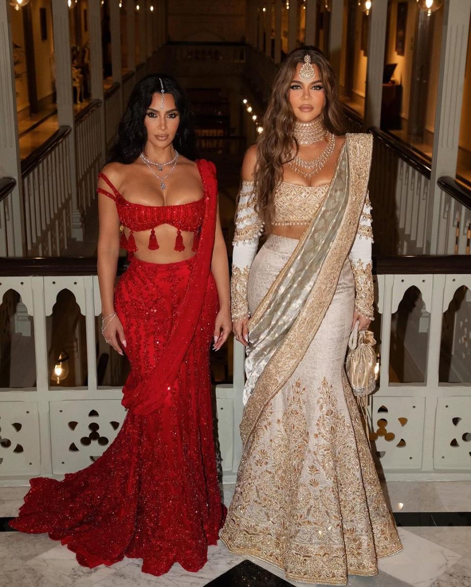 Kim and Khloé Kardashian in saris by Manish Malhotra.