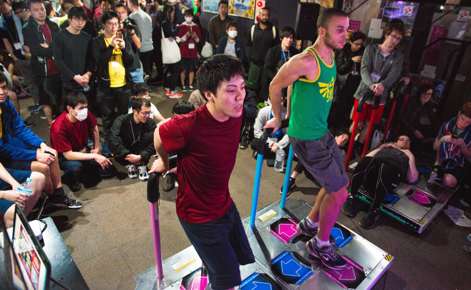 Even in a packed arcade, David Maiman stands out from the crowd. He's wearing