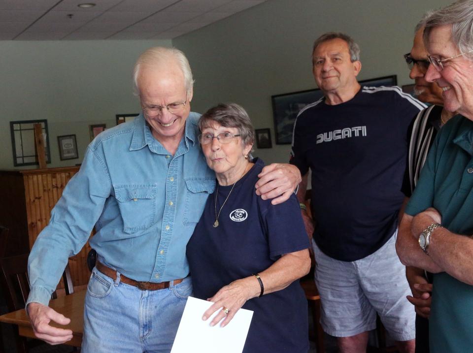 Michael Dow and Norma Clark have a moment when telling stories as they are both York natives during the Committee for Veterans' Affairs of York presentation to honor her Aug. 17.