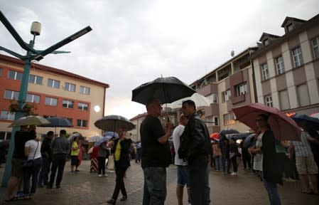 People take part in a protest against migrants in the Bosnian town of Bihac