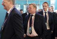 The Netherlands coach Ronald Koeman, center, arrives for the the UEFA Euro 2020 European soccer championship qualifying draw at the Convention Centre in Dublin, Ireland, Sunday, Dec. 2, 2018. (AP Photo/Peter Morrison)