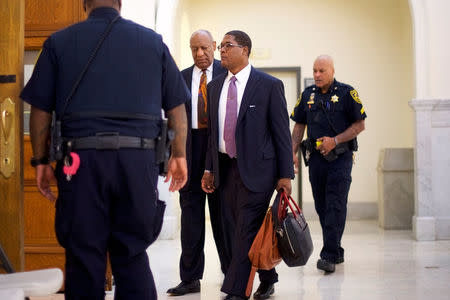 Actor and comedian, Bill Cosby, arrives for his sexual assault retrial case at the Montgomery County Courthouse in Norristown, Pennsylvania, U.S., April 19, 2018. Mark Makela/Pool via Reuters