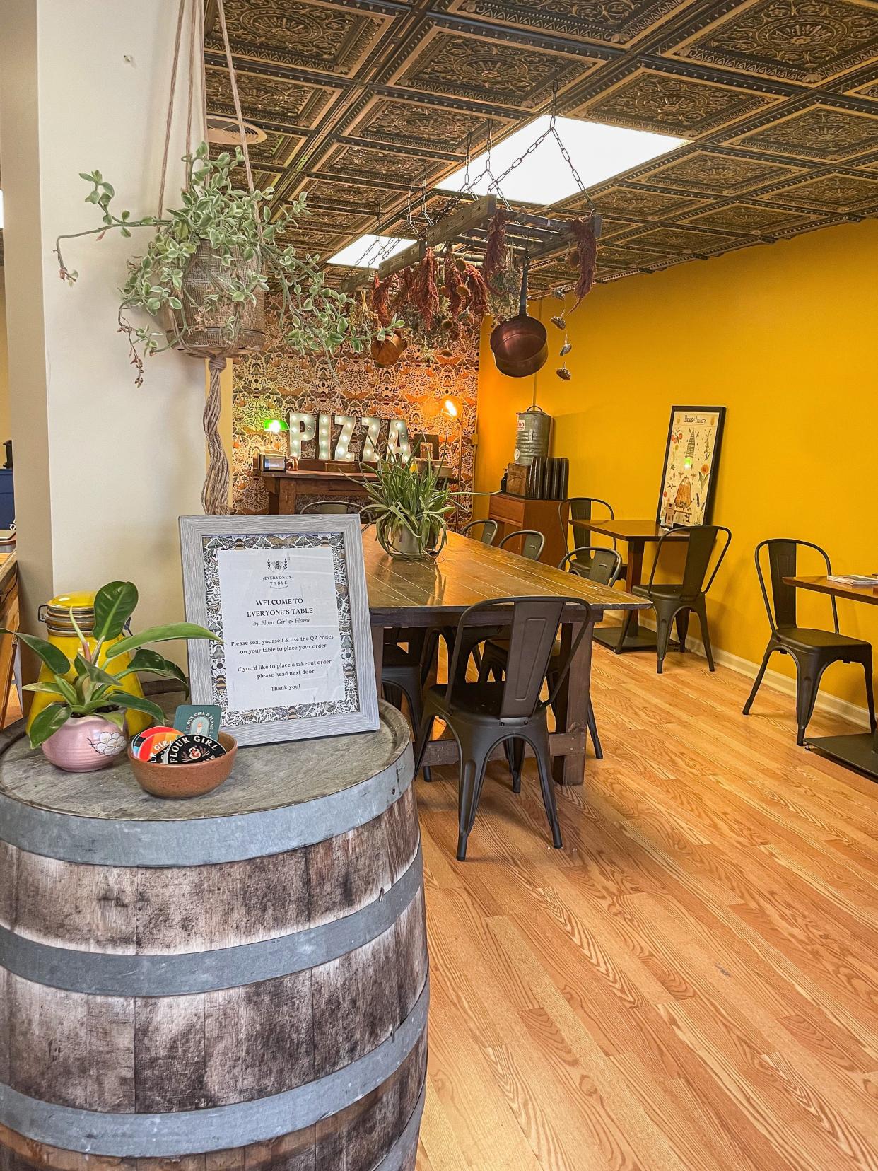 Flour Girl and Flame's new dining area includes a mix of small and large tables in the building next door called Everyone's Table, 8125 W. National Ave., West Allis.