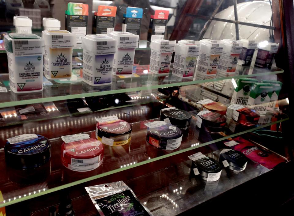 Various brands of gummy edibles are for sale at Greenhouse of Walled Lake in Walled Lake on July 18, 2023. When entering any dispensary, you need to have a driver's license or state ID showing that you are 21. Dispensaries also  take only cash but have ATM machines available for use.