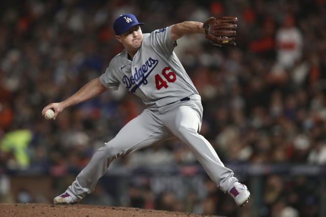 Urías hits, pitches Dodgers past Giants to even NLDS series