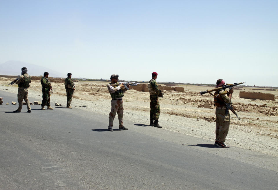 Afghan security personnel patrol after they took back control of parts of the city of Herat following fighting between Taliban and Afghan security forces on the outskirts of Herat, 640 kilometers (397 miles) west of Kabul, Afghanistan, Sunday, Aug. 8, 2021. (AP Photo/Hamed Sarfarazi)