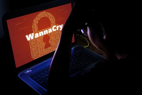   <span class="attribution"><a class="link " href="https://www.shutterstock.com/image-photo/wannacry-ransomware-attack-on-notebook-screencyber-644143564" rel="nofollow noopener" target="_blank" data-ylk="slk:supimol kumying/Shutterstock;elm:context_link;itc:0;sec:content-canvas">supimol kumying/Shutterstock</a></span>