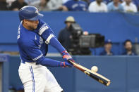 Toronto Blue Jays' George Springer breaks his bat on a pitch from Boston Red Sox's Micheal Wacha during the fourth inning of a baseball game Tuesday, June 28, 2022, in Toronto. (Jon Blacker/The Canadian Press via AP)