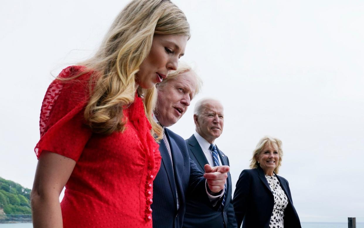 'We both married way above our stations' Mr Biden said during the official photocall in Carbis Bay today -  AP