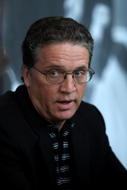 Kings GM Dean Lombardi says the NHL and teams need to do more to educate players on off-ice issues. (Getty)