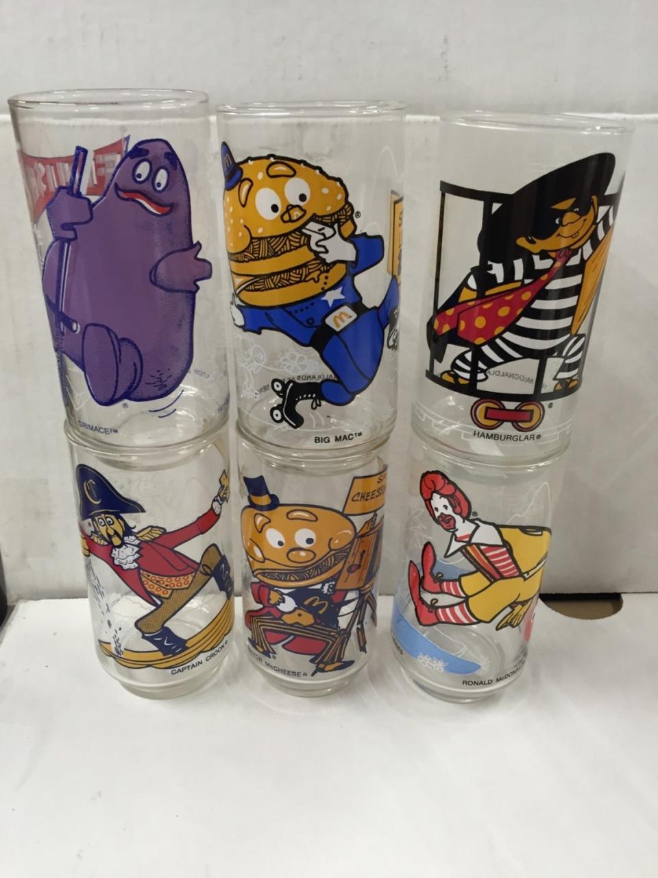 six different glasses featuring mcdonald's characters on them