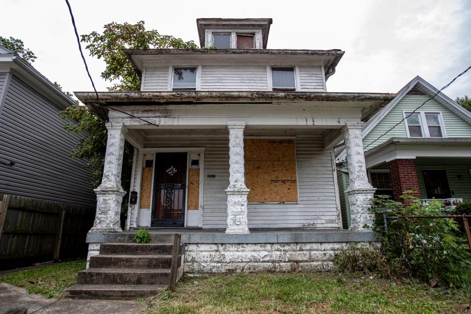 This abandoned house on W. Kentucky Street in Louisville's California neighborhood is covered in peeling paint that tested positive for lead. Aug. 1, 2023.