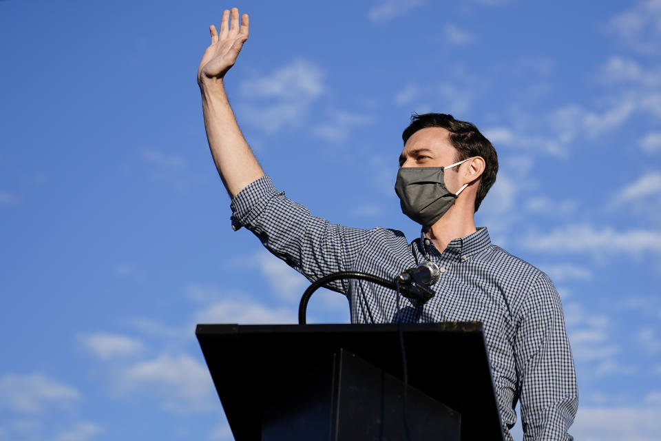 Georgia Democratic candidate for U.S. Senate Jon Ossoff speaks during a rally, Sunday, Nov. 15, 2020, in Marietta, Ga. Ossoff and Republican Sen. David Perdue are in a runoff election for the Senate seat. (AP Photo/Brynn Anderson)