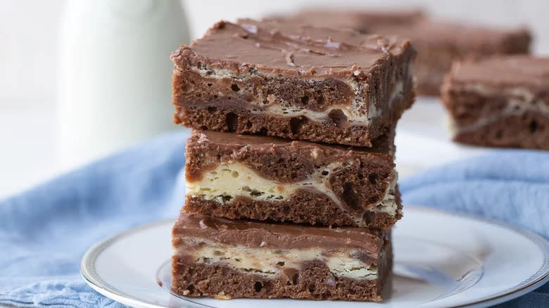 Cream cheese brownies on plate