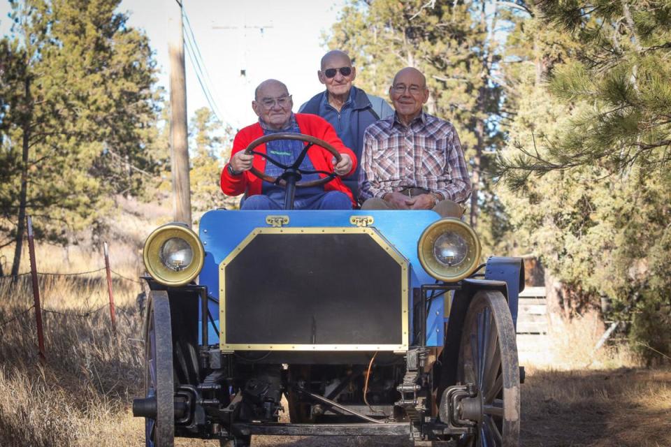 From left: brothers Bob Grimm, 94, Dave Grimm, 87, and Don Grimm, 88, of Rapid City sit in the 1907 International Harvester high-wheeler auto buggy they spent four years building. Bob said the auto buggy will likely be used for parades or displayed in car shows.