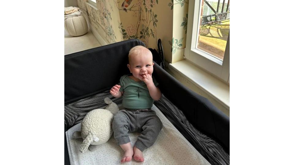 Gordon Ramsay's son Jesse smiling in his cot