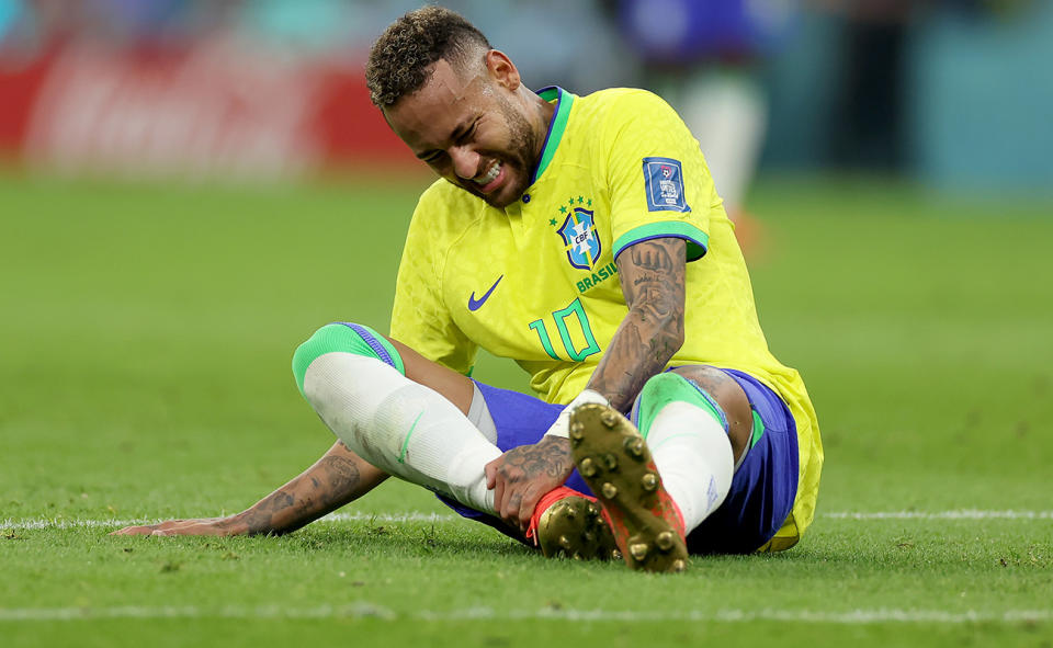 Neymar, pictured here after suffering an injury against Serbia at the World Cup.