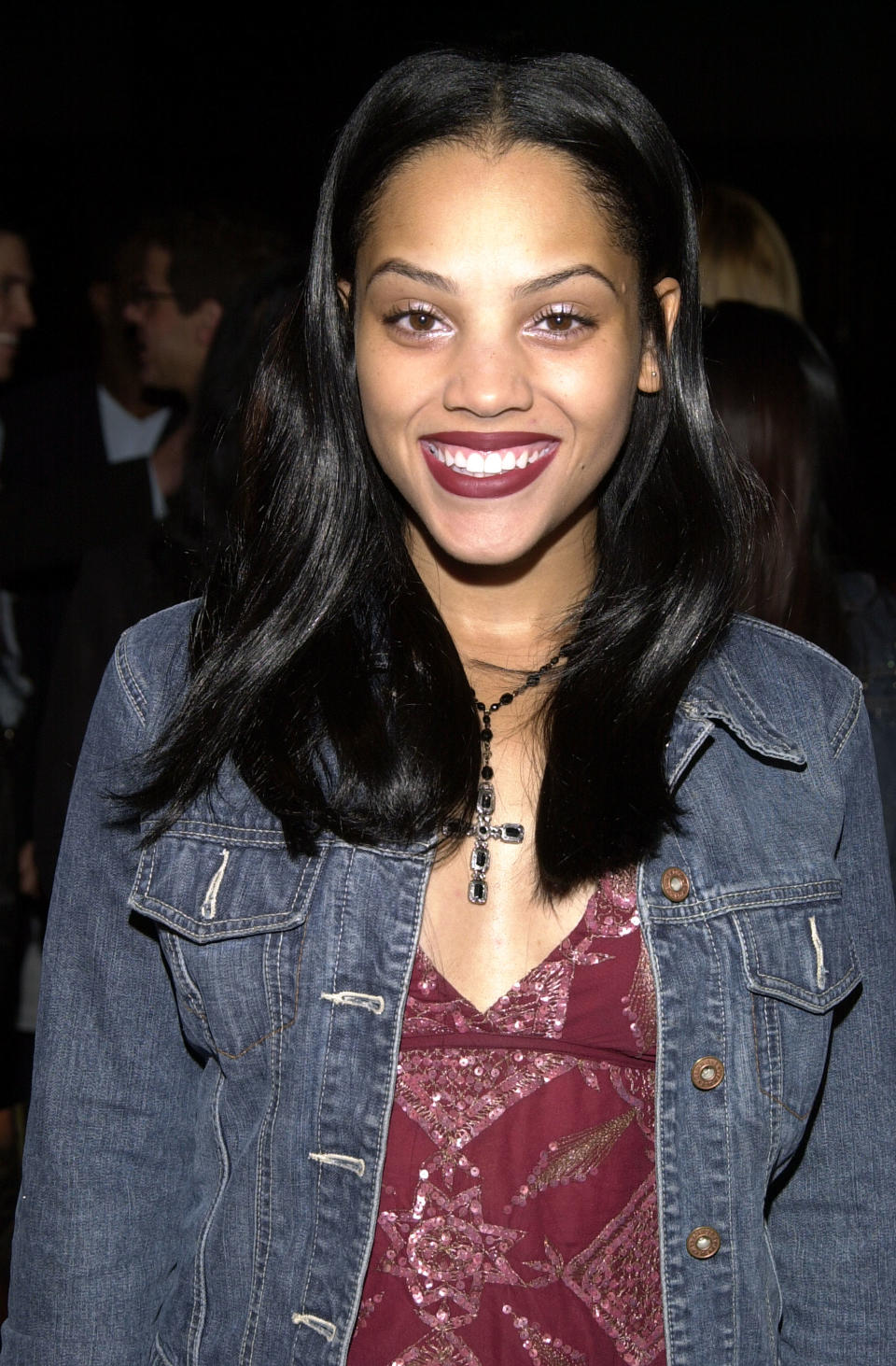 closeup of her in a jean jacket