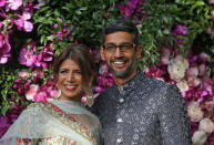 Google CEO Sundar Pichai and his wife Anjali Pichai pose during a photo opportunity at the wedding ceremony of Akash Ambani, son of the Chairman of Reliance Industries Mukesh Ambani, at Bandra-Kurla Complex in Mumbai, India, March 9, 2019. REUTERS/Francis Mascarenhas