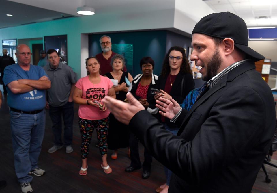 Mark Lee Dickson, the director of Right to Life of East Texas and founder of the sanctuary cities initiative, speaks in April to a group of community activists after the Abilene City Council voted to send the "sanctuary city" ordinance before them to voters in November.