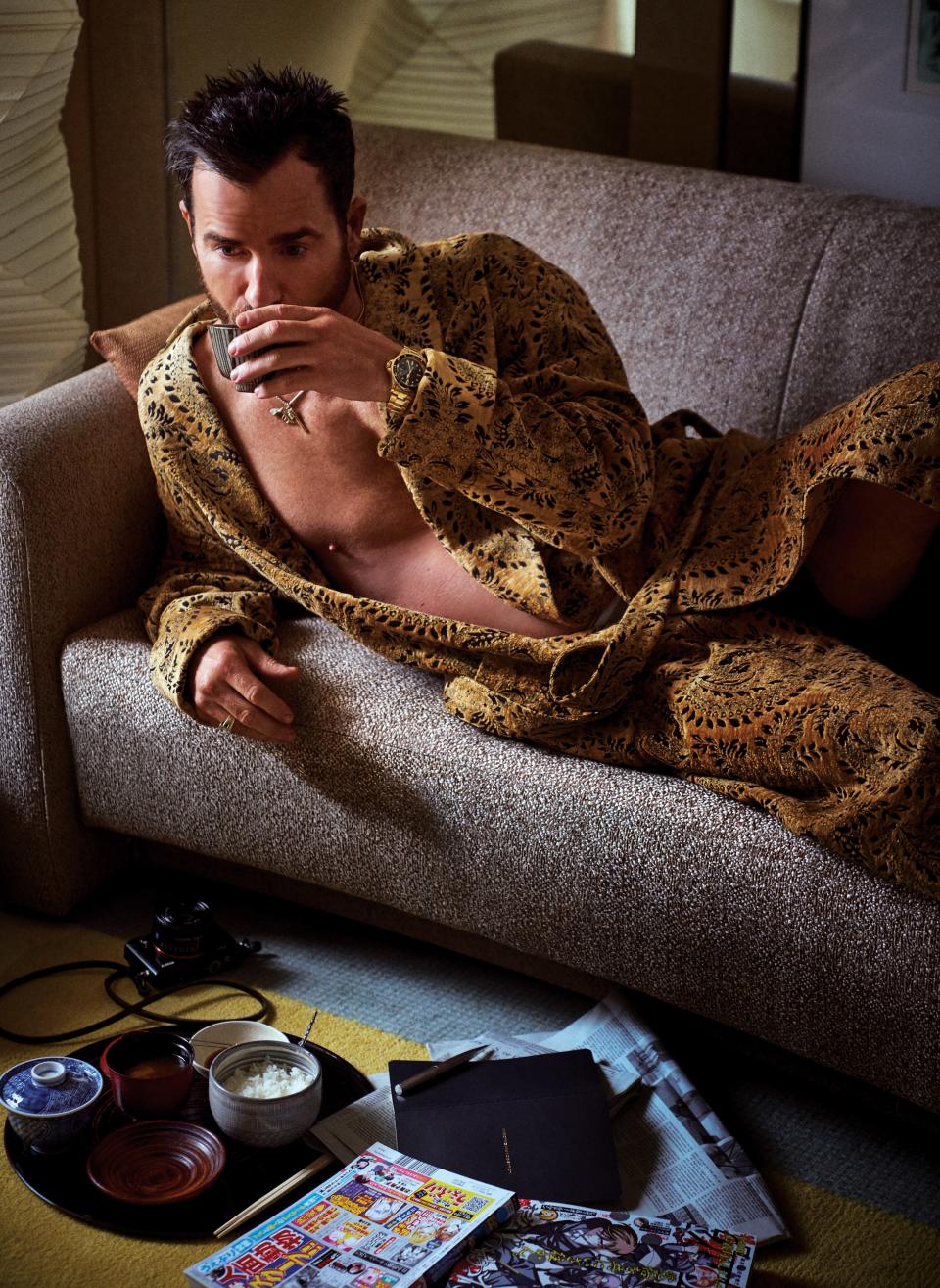 <cite class="credit">Robe, $1,300, by Triple RRR / Boxers, $30 (for pack of two), by Calvin Klein Underwear / Watch and jewelry, his own | Location: Park Hyatt Hotel</cite>