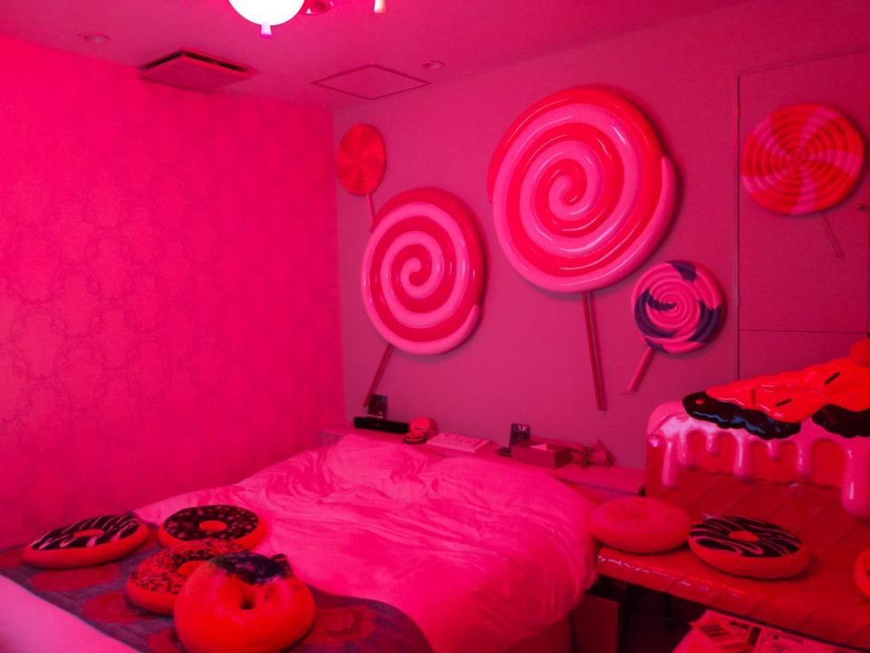 love hotel bedroom with pink lights