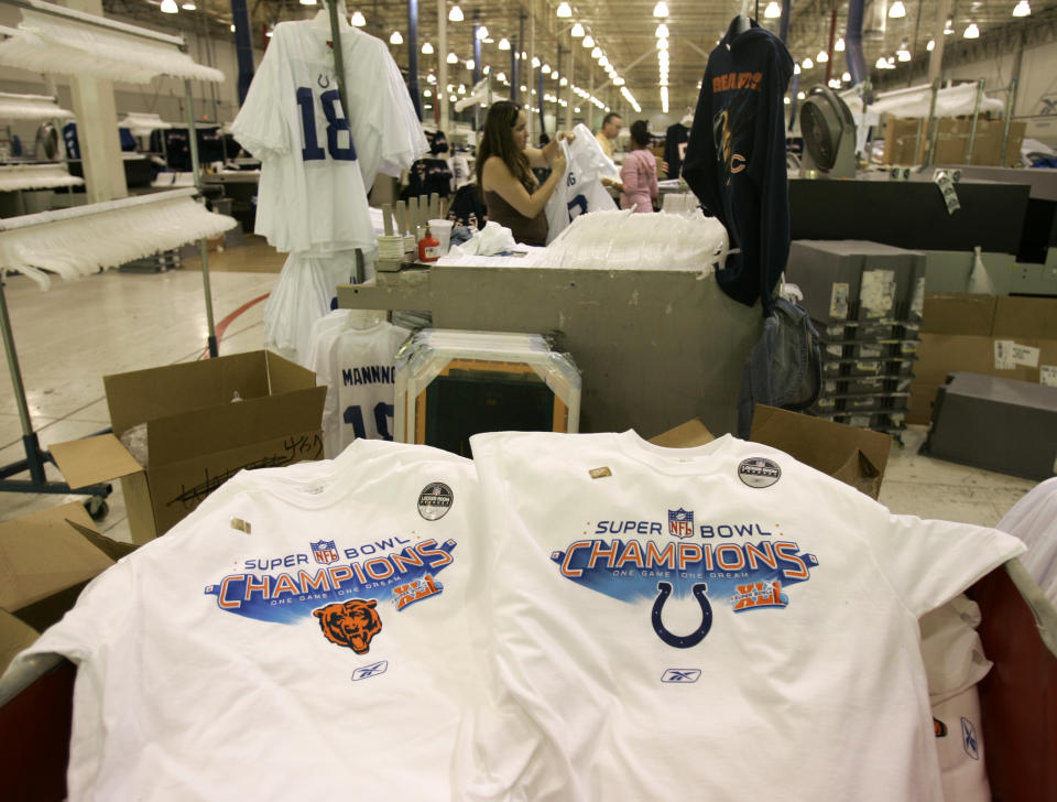 **FILE**Reebok locker room T-shirts bound for Miami and the winner of  Super Bowl XLI between the Indianapolis Colts and the Chicago Bears await shipping after they were printed in Indianapolis, Wednesday, Jan. 24, 2007. The Colts-Bears matchup for Sunday's game has proven popular enough that its clothing sales could be among the five best-ever among Super Bowls, said Eddie White, the vice president of sports marketing for Reebok, which makes NFL apparel. The Super Bowl will be held in Miami on Feb. 4. (AP Photo/Michael Conroy, File)