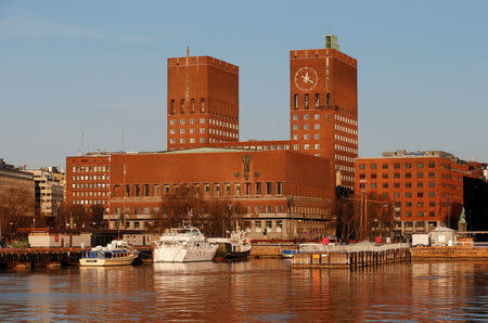 Yachts are parked outside City Hall in Oslo. REUTERS/Suzanne Plunkett