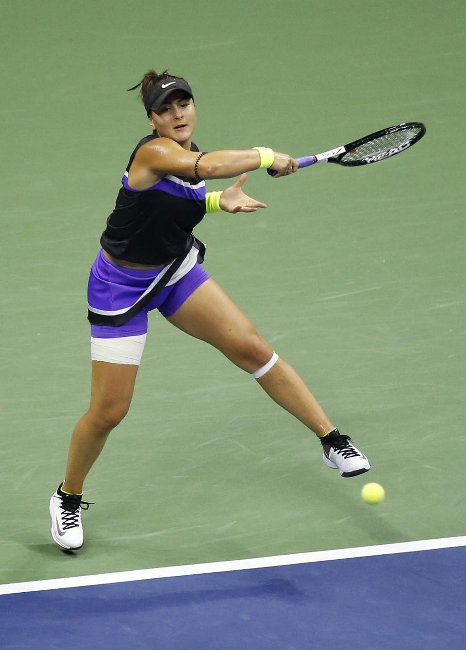 Bianca Andreescu, of Canada, returns a shot to Taylor Townsend, of the United States, during the fourth round of the U.S. Open tennis tournament, Monday, Sept. 2, 2019, in New York. (AP Photo/Jason DeCrow)