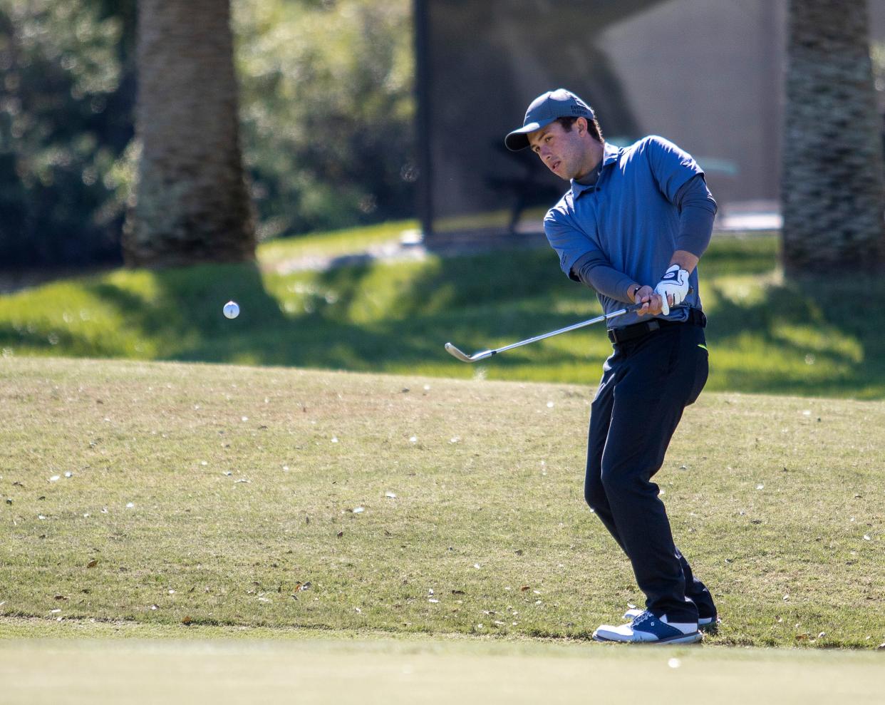 Eastern Florida State College golfer John Houchin of Merritt Island hits the ball in a recent tournament.