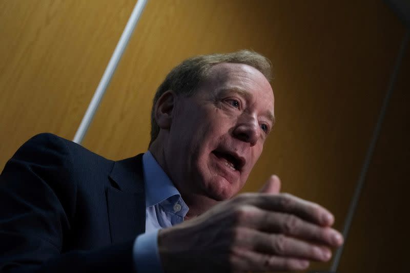 FILE PHOTO: President of Microsoft Brad Smith reacts during an interview with Reuters at the Web Summit, in Lisbon