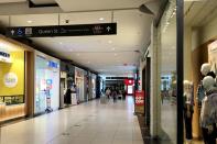 A relatively small number of shoppers walk in Eaton Centre in downtown Toronto