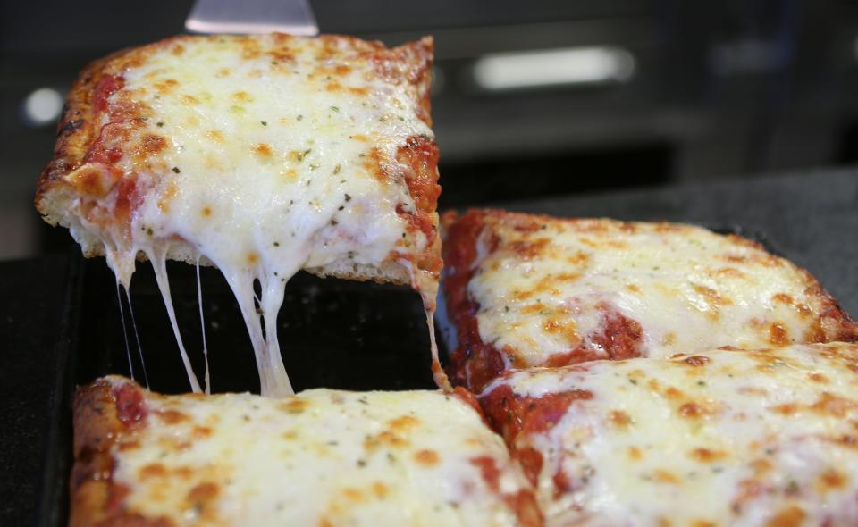 A slice of Sicilian Pizza fresh out of the oven at V&M Bistro in Brandywine Hundred.