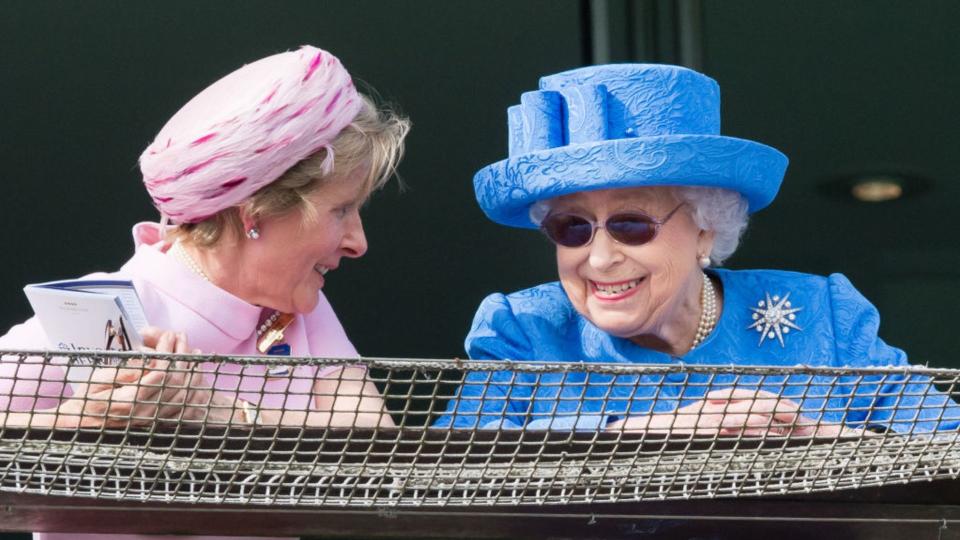Queen Elizabeth II watches the racing from the royal balcony as she attends the Epsom Derby at Epsom Racecourse on June 01, 2019