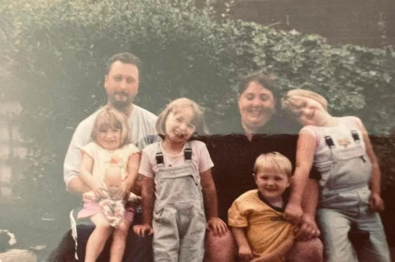 Debbie and her husband Graham with their children Amy, Sophie, Laura and Daniel