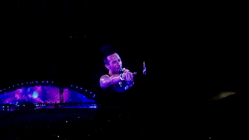 A picture of Coldplay's lead singer, Chris Martin, at Malaysia's Bukit Jalil National Stadium during the Coldplay concert.