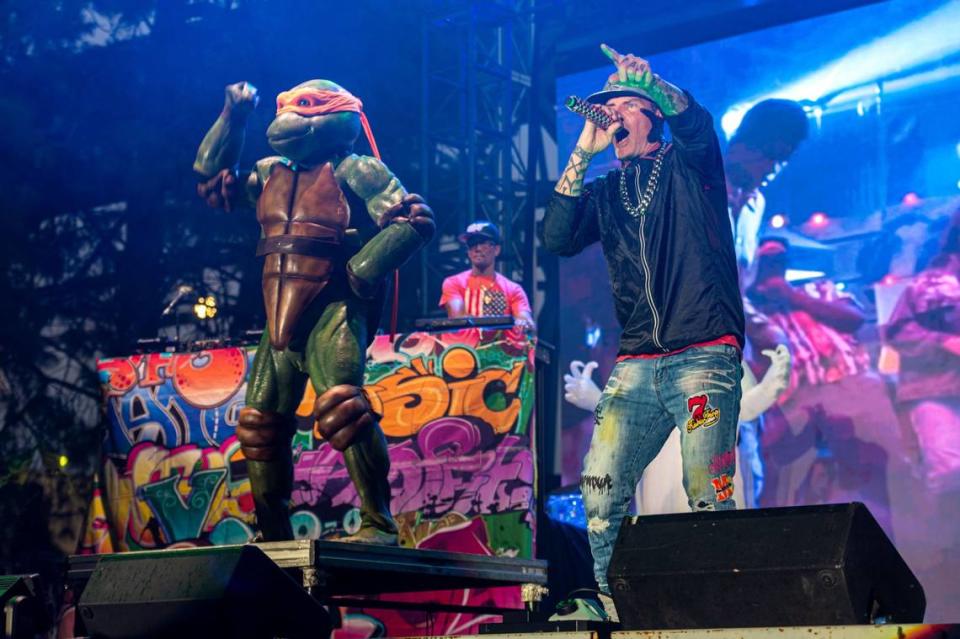 Vanilla Ice performs “Ninja Rap” accompanied by Teenage Mutant Ninja Turtle Michelangelo on the Golden 1 Stage during the California State Fair at Cal Expo on Friday.