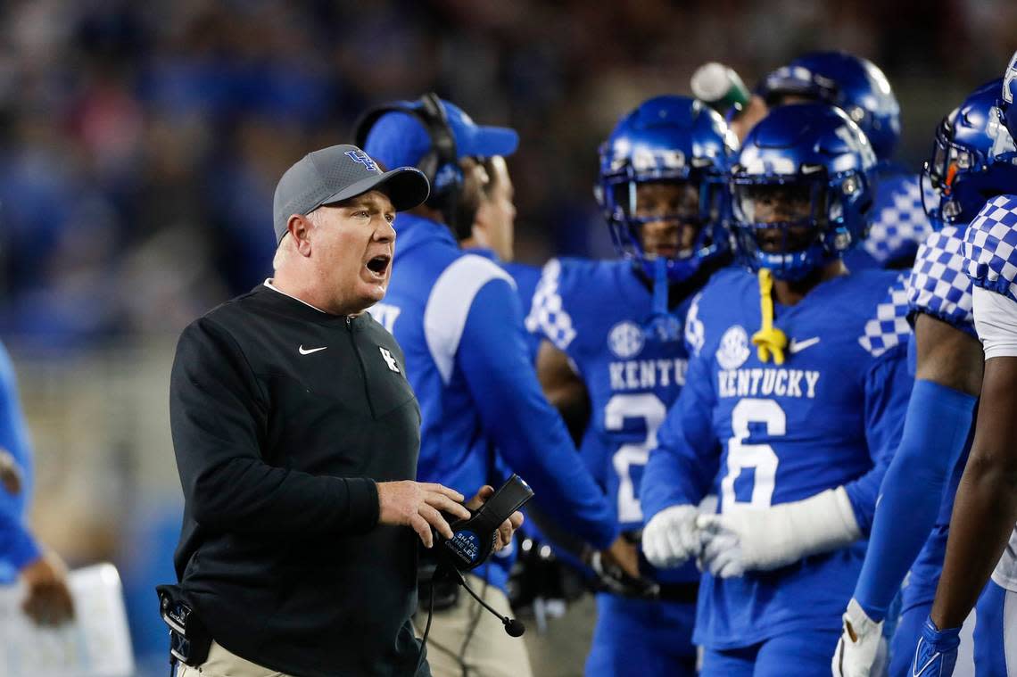 Kentucky Wildcats head coach Mark Stoops speaks with a referee during a time out during the game with Mississippi State Bulldogs at Kroger Field in Lexington, Ky., Saturday, October 15, 2022.