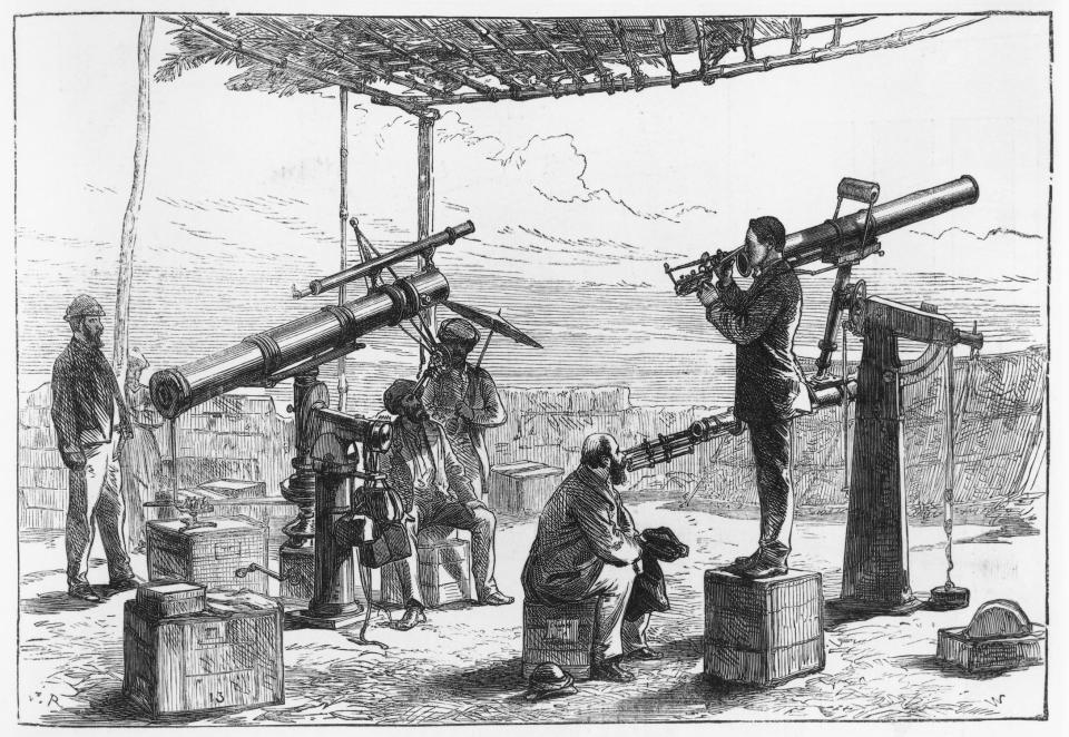 A drawing of several people seated and standing around astronomical equipment in the late 19th century in India