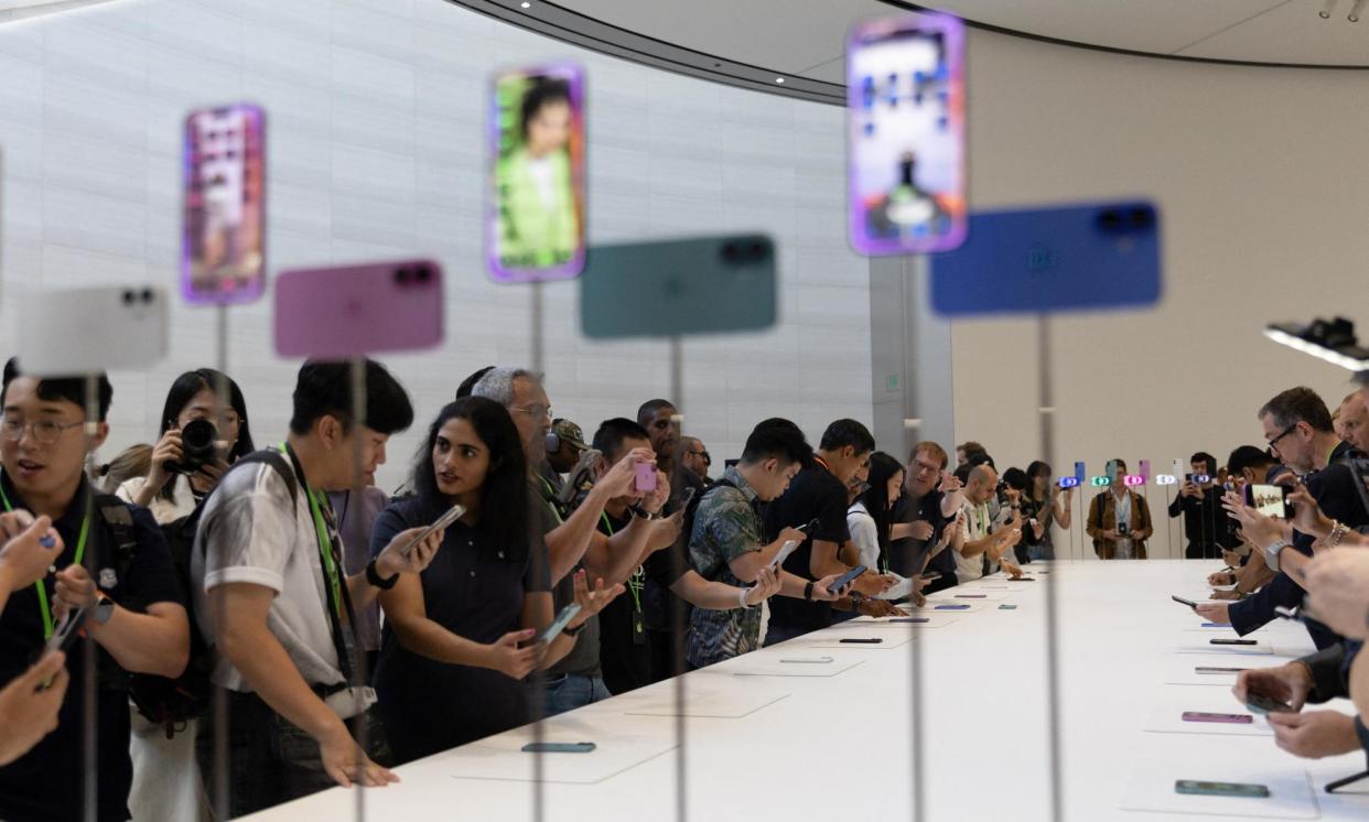 <span>Apple holds an event at the Steve Jobs Theater on its campus in Cupertino.</span><span>Photograph: Manuel Orbegozo/Reuters</span>