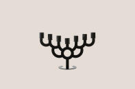 <p>Whoever said a menorah can't make a statement has obviously never seen the Menorah Bold at Moooi. Composed of steel with a powder-coated black finish, this menorah designed by Roderick Vos will instantly liven up any Hanukkah table.</p><p><em>Moooi Menorah Bold, $449, </em><a href="https://shop-us.moooi.com/products/menorah-bold-black-ral-9005" rel="nofollow noopener" target="_blank" data-ylk="slk:shop-us.moooi.com;elm:context_link;itc:0;sec:content-canvas" class="link "><em>shop-us.moooi.com</em></a><em>.</em></p>