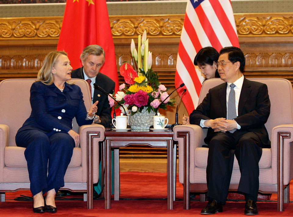 BEIJING, CHINA - MAY 4: U.S. Secretary of State Hillary Clinton (L) talks to China's President Hu Jintao (R) during a meeting at the Great Hall of the People on May 4, 2012 in Bejing, China. Gary Locke, Secretary Clinton, Treasury Secretary Timothy F. Geithner attended a fourth joint meeting of the U.S.-China Strategic and Economic Dialogue with Chinese officials. (Photo by Jason Lee-Pool/Getty Images)