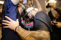 Boston Red Sox's Blake Swihart, right, celebrates with teammates after the Red Sox clinched the AL East title with an 11-6 win over the New York Yankees in a baseball game Thursday, Sept. 20, 2018, in New York.(AP Photo/Frank Franklin II)