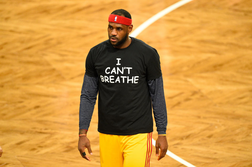 December 8, 2014: Cleveland Cavaliers forward LeBron James (23) wears a t shirt to honor Eric Garner during warmups before a NBA game between the Cleveland Cavaliers and the Brooklyn Nets at Barclays Center in Brooklyn, NY The Cleveland Cavaliers defeated the Brooklyn Nets 110-88. (Photo by Rich Kane/Icon Sportswire/Corbis/Icon Sportswire via Getty Images)