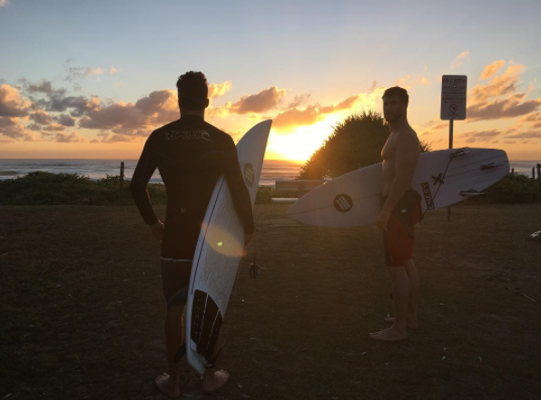 Chris Hemsworth heading out for a surf in Australia. Source: Instagram.