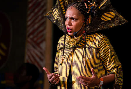 Storyteller Mainmouna Jallow performs to the crowd at the Re-imagined Storytelling Festival in Nairobi, Kenya December 15, 2018. REUTERS/Hereward Holland