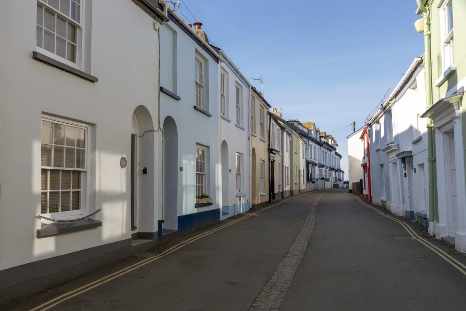 Appledore, North Devon, England, UK, Very narrow street of terraced homes in this popular seaside Devonshire town in winter. (Photo by: Peter Titmuss/Education Images/Universal Images Group via Getty Images)