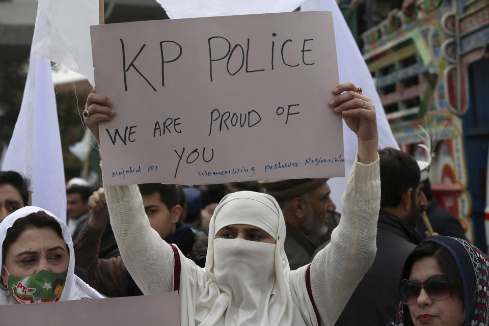 Supporters of Pakistan Tehreek-e-Insaf party take part in a rally denouncing militant attacks and demanding peace in the country, in Peshawar, Pakistan, Friday, Feb. 3, 2023. (AP Photo/Muhammad Sajjad)